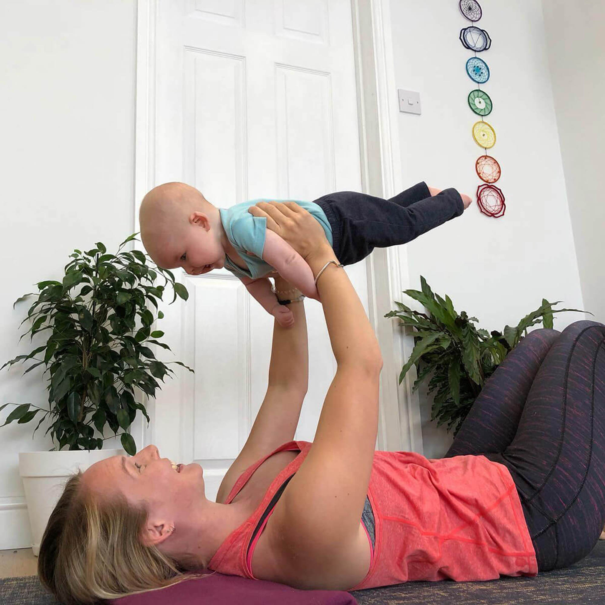 Sinead doing yoga with her son