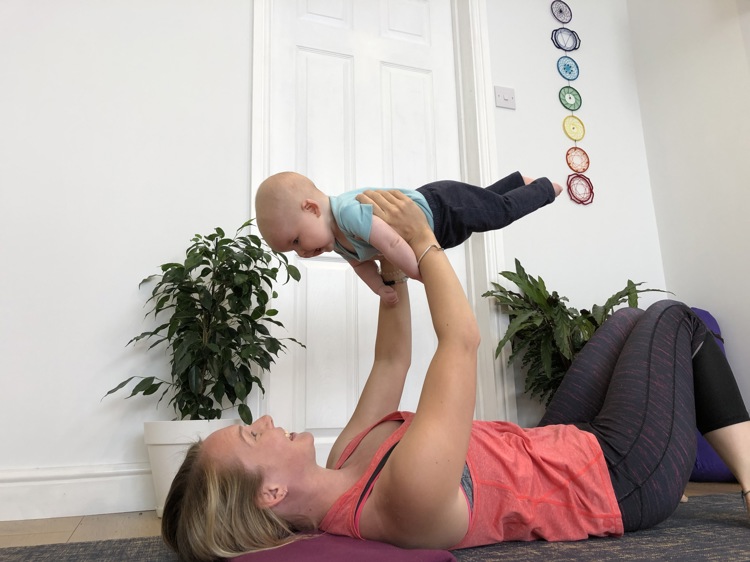 Sinead doing yoga with her baby son